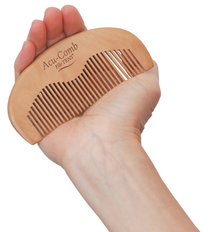 Acu-Comb held in the palm