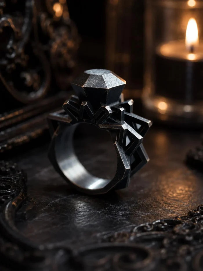 Brutalist sterling silver solitaire ring with a sharp planar geometric band, side view