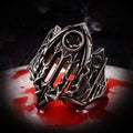 Burning Cathedral Ring — an openwork Gothic cathedral ruin in oxidized 925 sterling silver, dramatic smoke-and-red styling