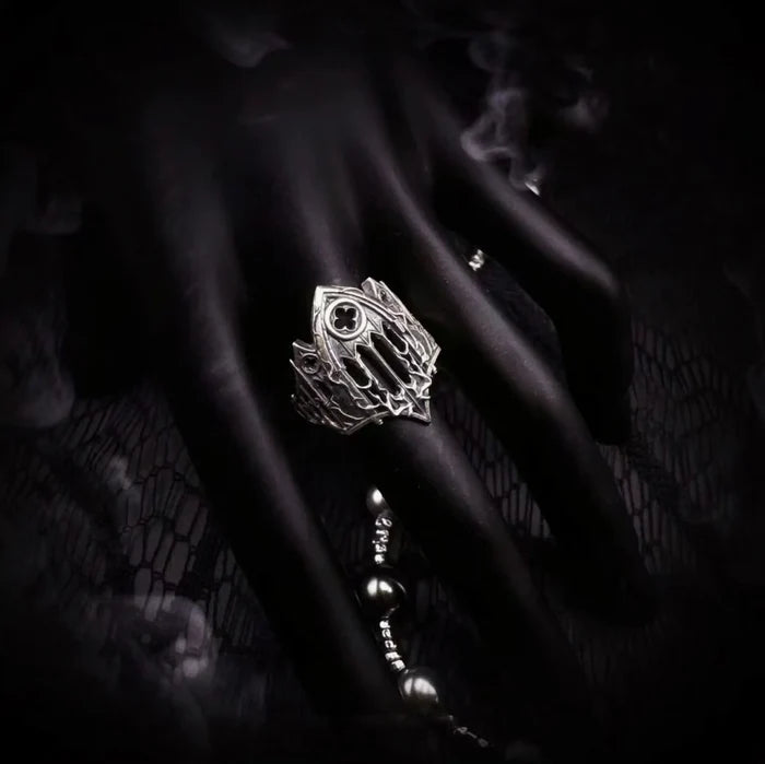 Burning Cathedral ring detail of the pierced Gothic tracery and cut rose window in oxidized silver