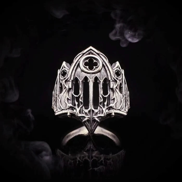 Front view of the Burning Cathedral Ring — pointed arch, cut rose window and pierced lancet tracery in oxidized silver