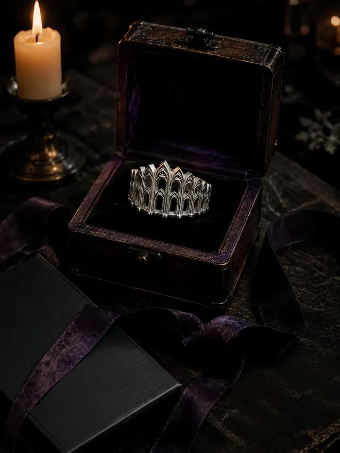 Cathedral Arcade Ring displayed in a jewelry box with ribbon and candlelight
