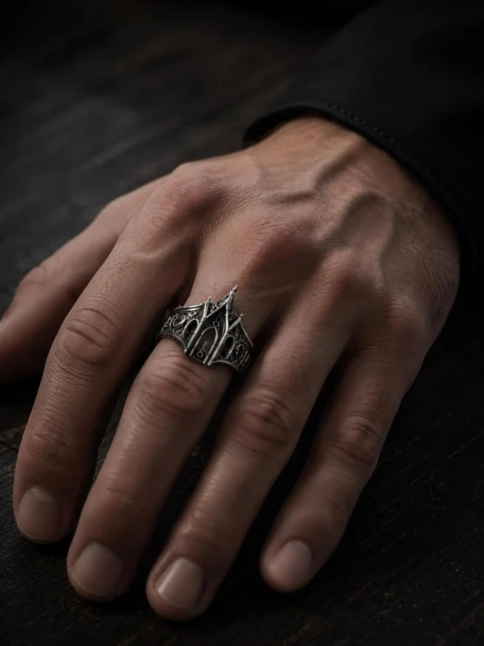 Hand wearing gothic cathedral lancet arch ring — alternative wedding band in oxidized 925 sterling silver