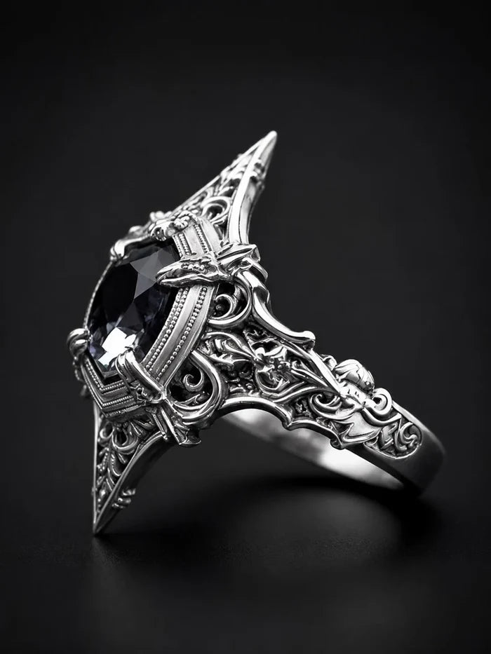 Cathedral marquise spire ring — white topaz in gothic spire setting with milgrain border detail