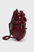 Heart-shaped handbag with a chain detail on a white background