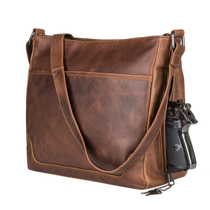 Concealed Carry Lydia Leather Crossbody -  YKK Locking Zippers and Universal Holster -  Soft Leather conceal and carry bag -  Tactical womans purse for pistol -  Concealed Carry Purse -  most popular crossbody bag -  crossbody handgun bag -  crossbody bags for everyday use -  Lady Conceal -  Unique Hide Purse -  Locking YKK Purse -  Fanny Pack for Gun and Pistol -  Easy CCW -  Fast Draw Bag -  Secure Gun Bag