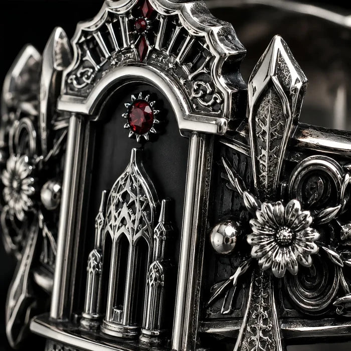 Detail of the sterling silver Gothic altar ring's openwork arches and architectural tracery