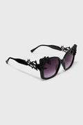 large black sunglasses with crescent moon charms