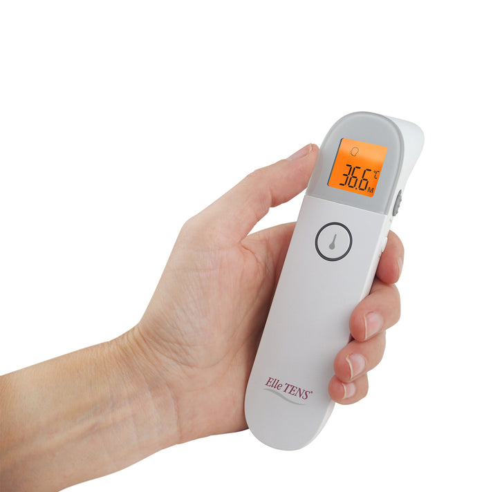 Elle TENS digital thermometer held in hand for accurate temperature measurement