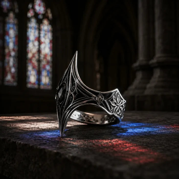 Elven Tear Ring side profile showing the kite-shaped filigree spire and tapered shank