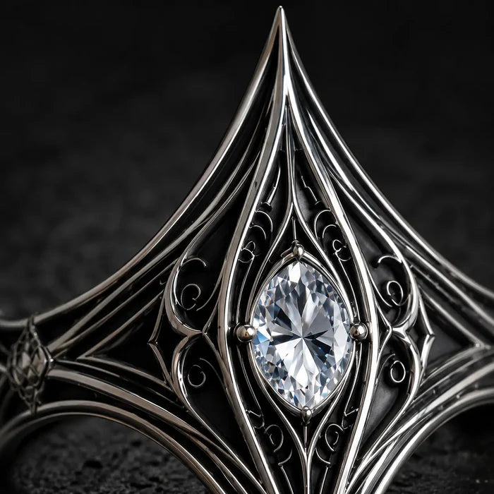 Macro close-up of the Elven Tear Ring's marquise moissanite and oxidized silver filigree