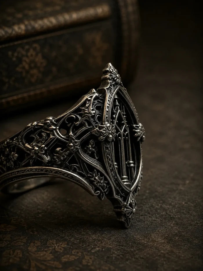 Close-up of gothic cathedral ring — oxidized recesses and carved gargoyle band in sterling silver