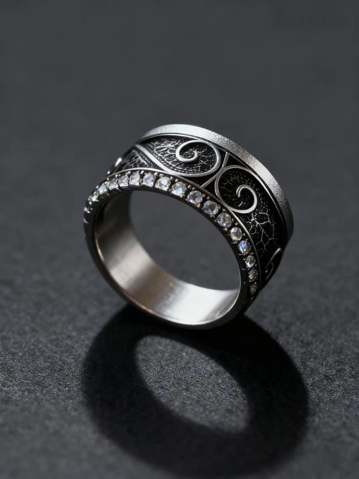 Filigree Pavé Ring angled detail, oxidized silver filigree and gold-rimmed pavé band