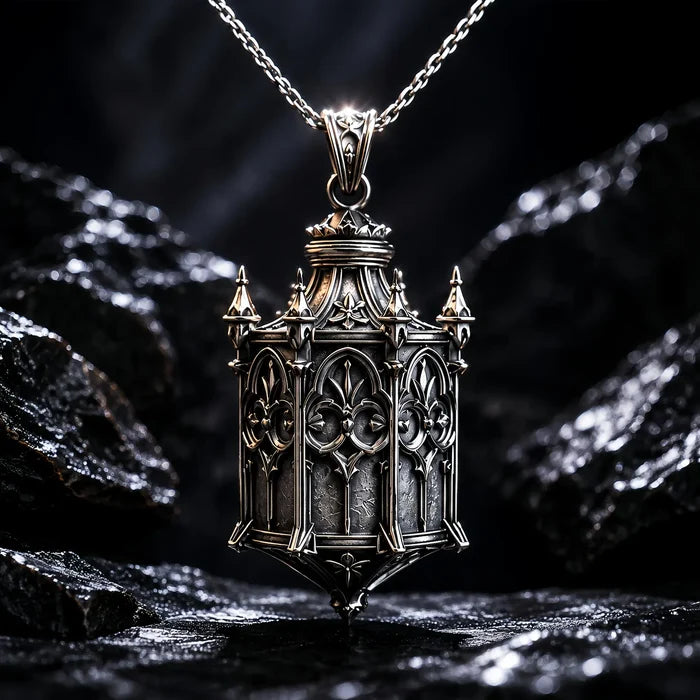 Sterling silver Cathedral Lantern Gothic pendant necklace on a chain against dark rock