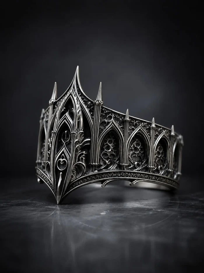Cathedral spire crown ring close-up — micro-pinnacles and gothic lancet arches in sterling silver