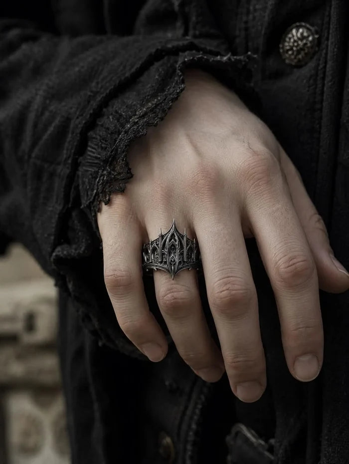 Hand wearing gothic spire crown ring — alternative wedding tiara band in 925 sterling silver