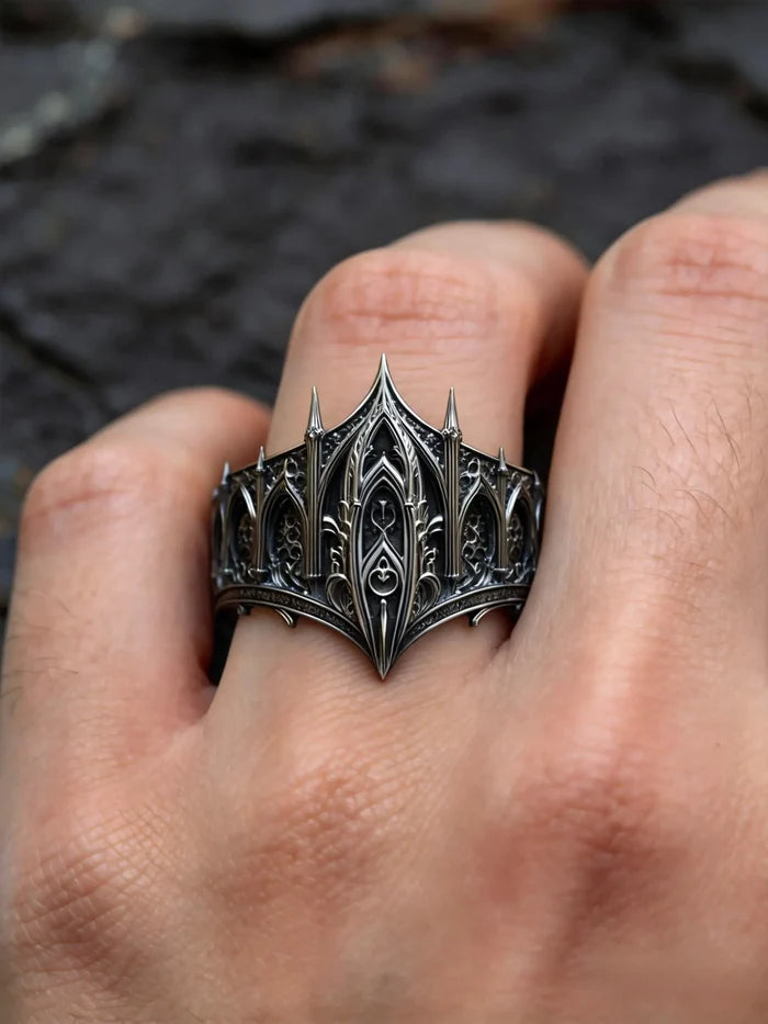 Hand wearing gothic spire crown ring — alternative wedding tiara band in 925 sterling silver