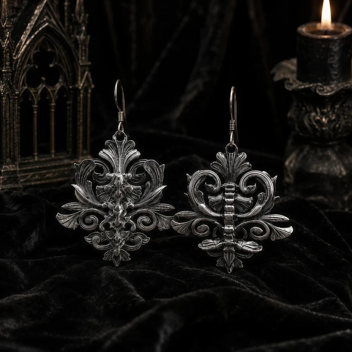 Iris and Spine dangle earrings side by side showing both gothic motifs