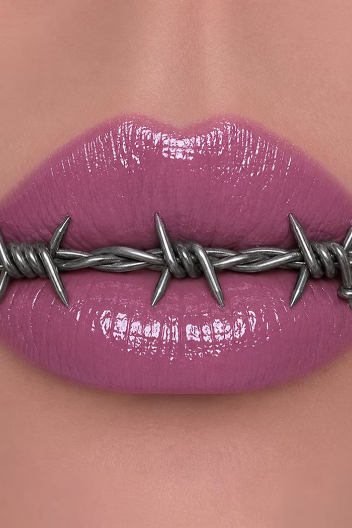 Curst Kosmetics shiny pink lip gloss
