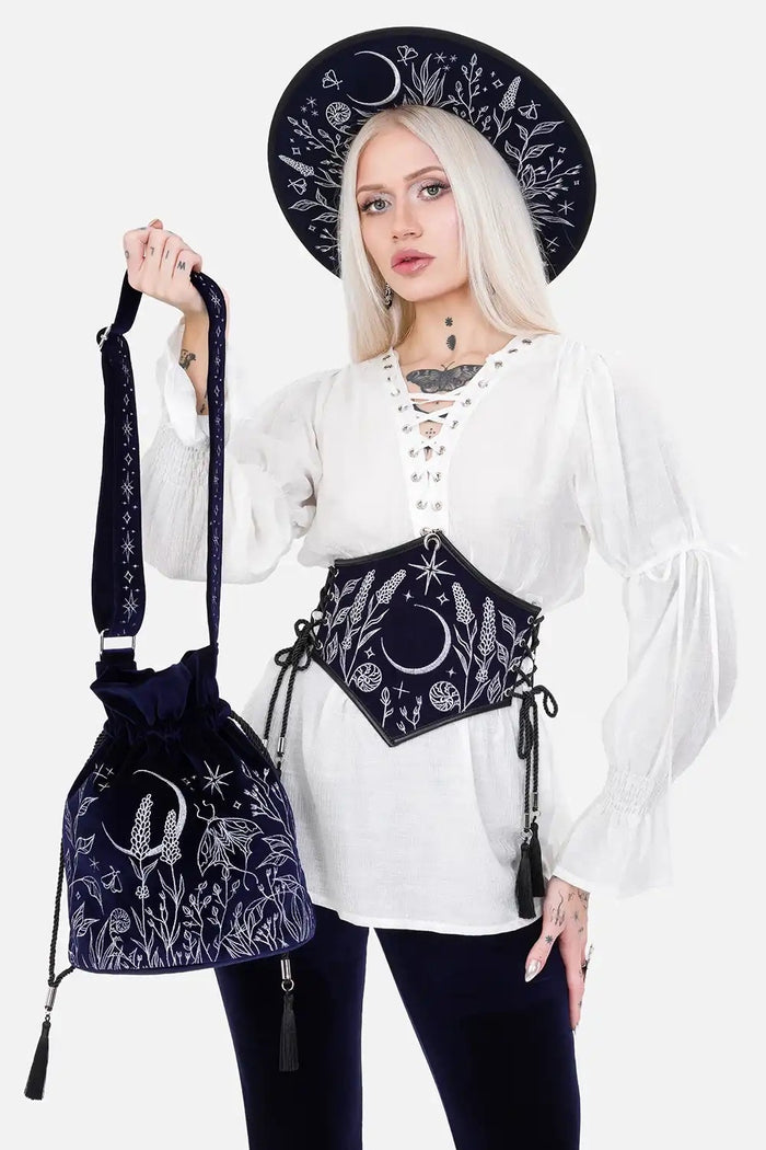 whimsical dark blue velvet embroidered moon and moth shoulder bag