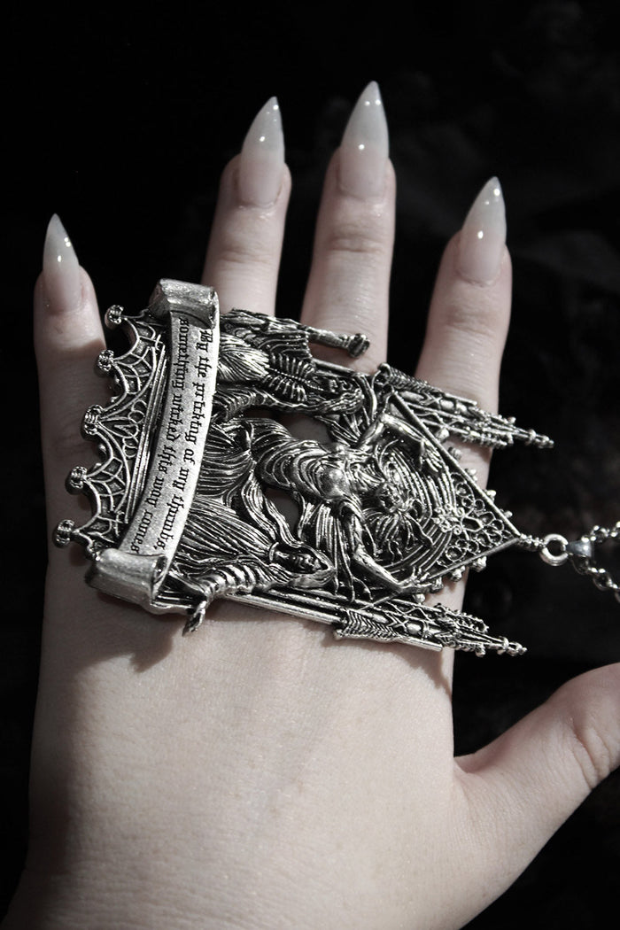 skeleton and nun necklace
