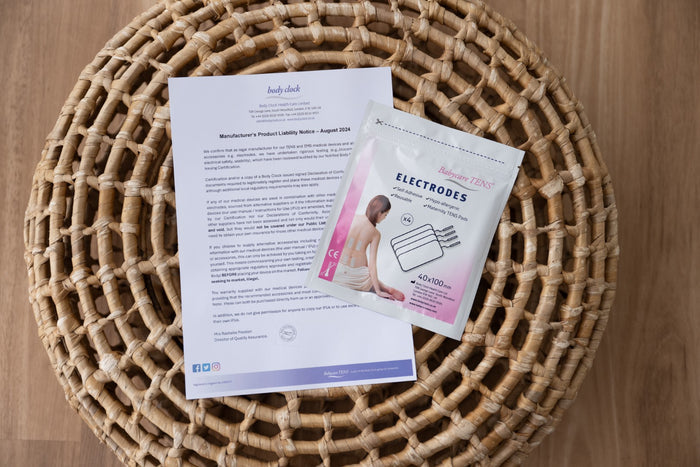 Elle TENS maternity TENS device showing controls and ergonomic design