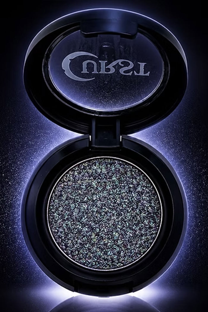 Single silver black sparkle chrome eyeshadow highlighter in compact