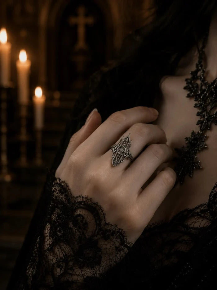 Hand wearing gothic mirrored cathedral spire ring — Dark Academia alternative wedding band in solid 925 silver