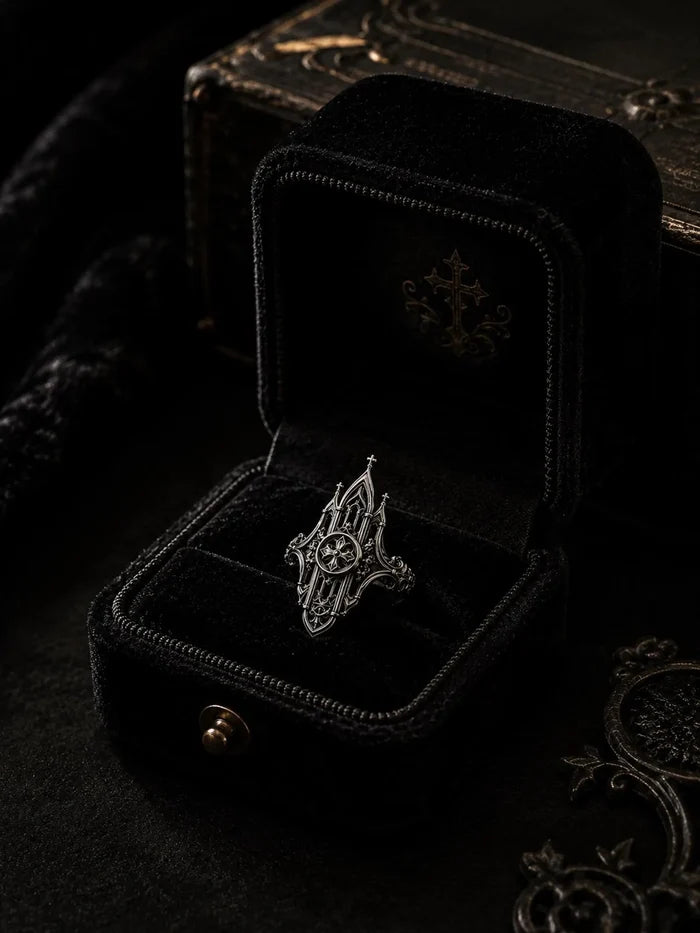Mirrored cathedral spire ring — gothic cross medallion and towering lancet arches reflected in 925 sterling silver