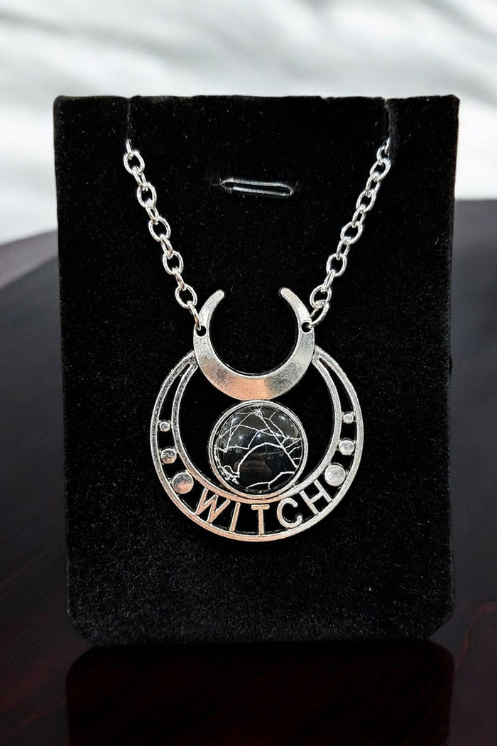 occult witch necklace made with a real spiderweb