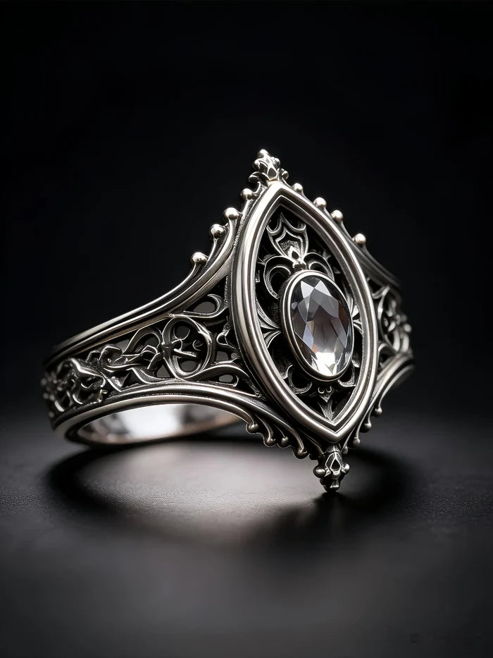 Sanctuary Window Ring front view, faceted center stone framed by tracery