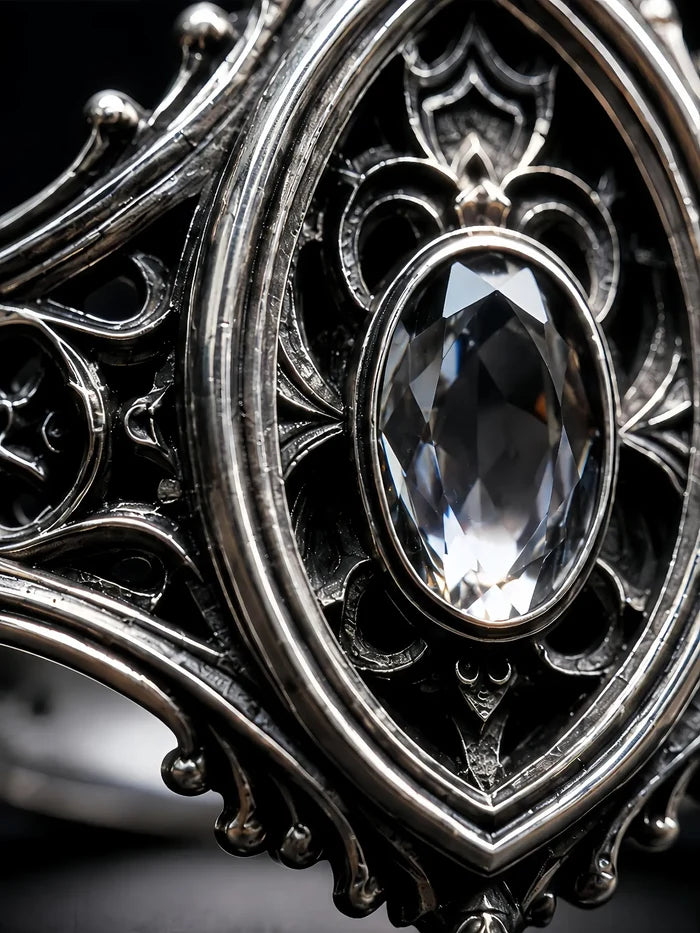 Sanctuary Window Ring close-up, oval-cut stone and carved fleur-de-lis detail