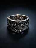 Sanctum Tracery Ring, wide pierced sterling silver band with raised cross, front view