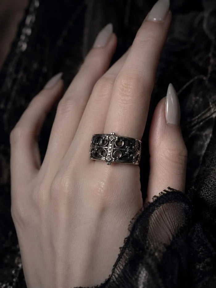 Sanctum Tracery Ring worn on hand with manicured nails, chunky Gothic band