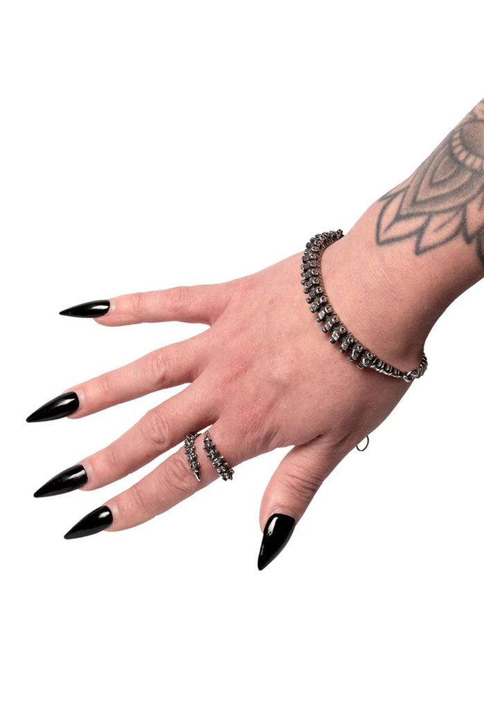 Finger wrap spine ring with vertebrae detail from Alchemy England
