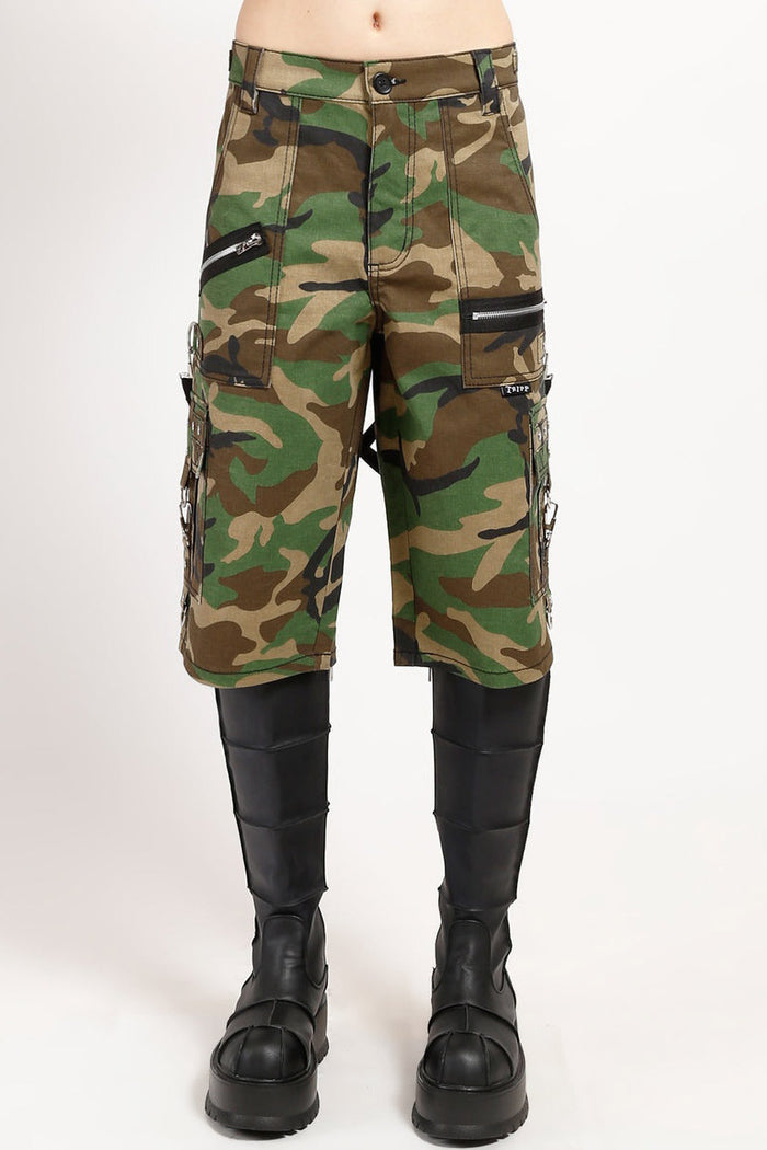 Camouflage shorts with black boots on a white background
