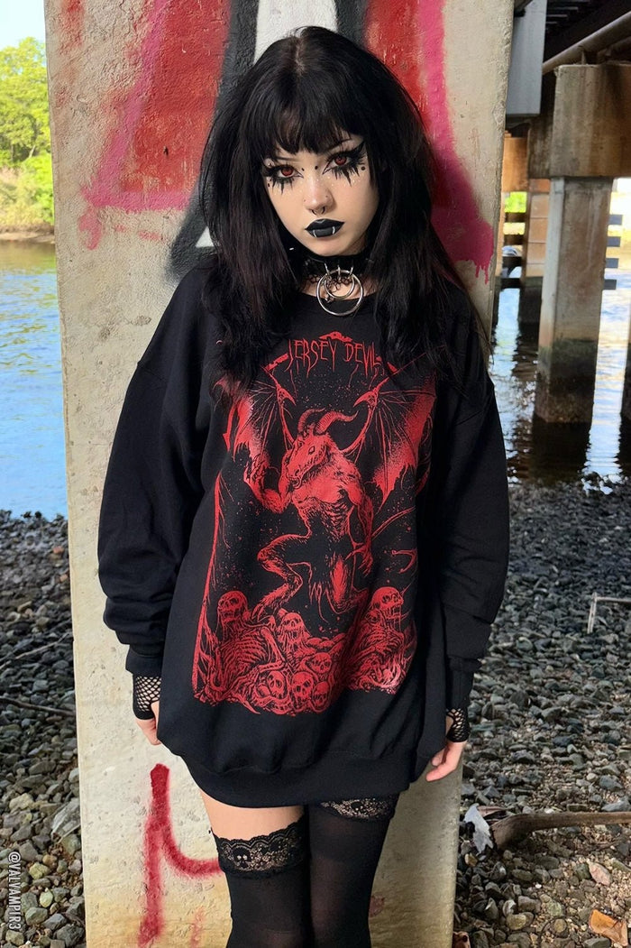gothic girl wearing an emo sweater